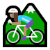 🚵🏽‍♀️ woman mountain biking: medium skin tone display on Windows